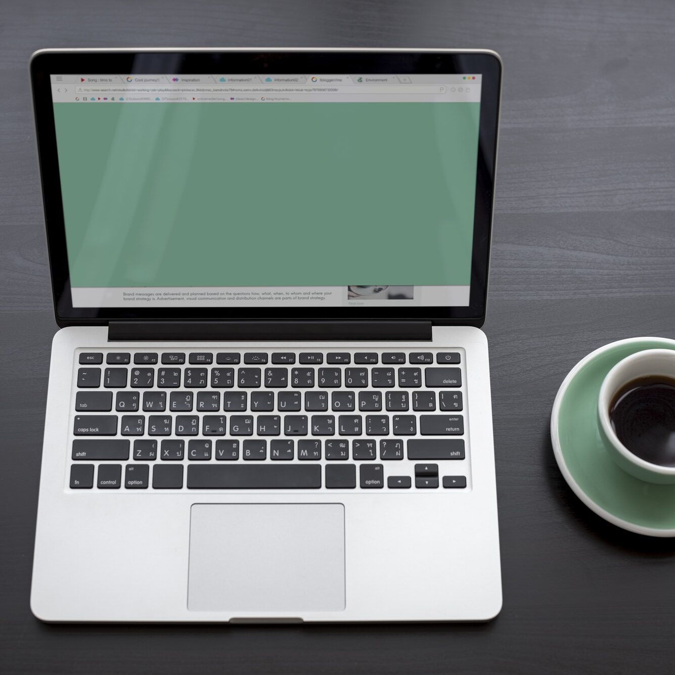 Laptop Showing Green Screen Desktop